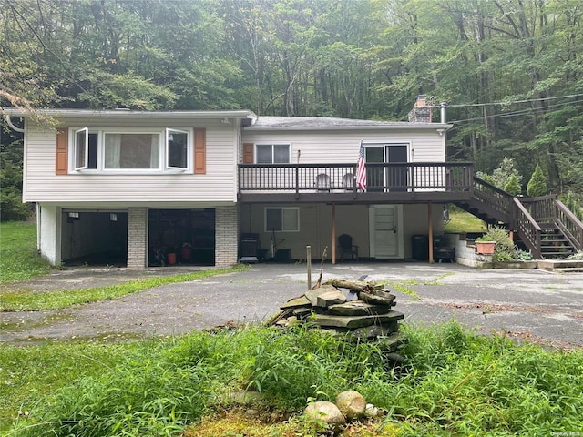 view of front of property with a deck