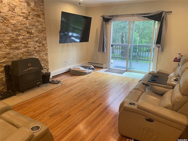 living room with light hardwood / wood-style floors, baseboard heating, and ornamental molding