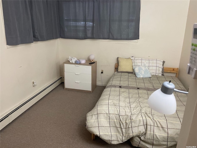 carpeted bedroom with baseboard heating