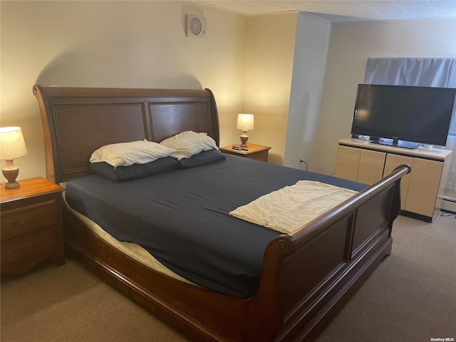 bedroom with light colored carpet