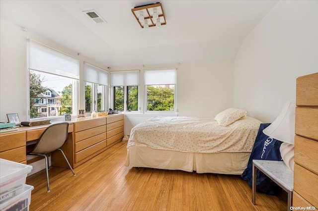 bedroom featuring light hardwood / wood-style floors