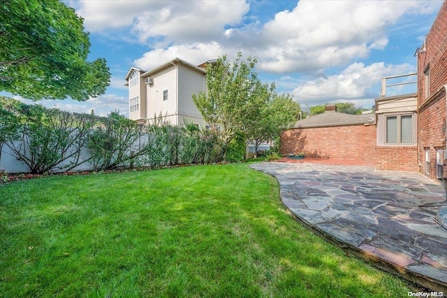 view of yard with a patio area