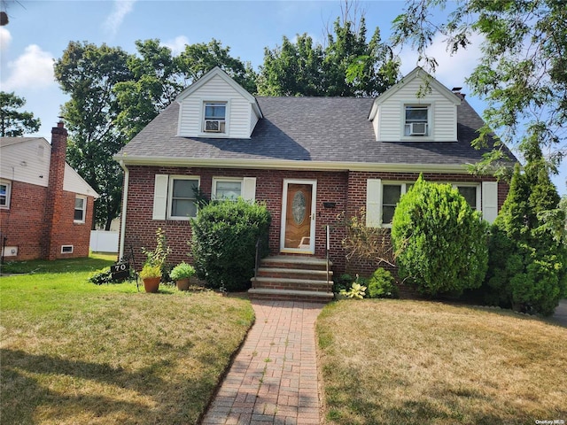 new england style home featuring a front yard