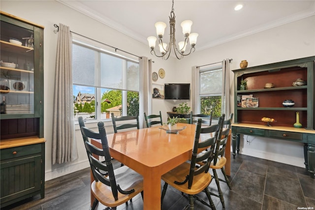 dining space with a notable chandelier, plenty of natural light, dark hardwood / wood-style floors, and crown molding