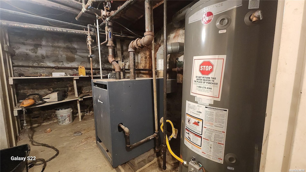 utility room with water heater