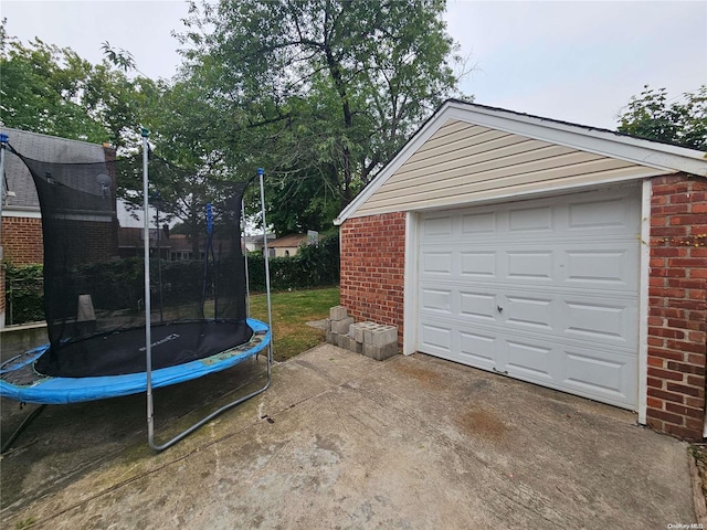 garage with a trampoline