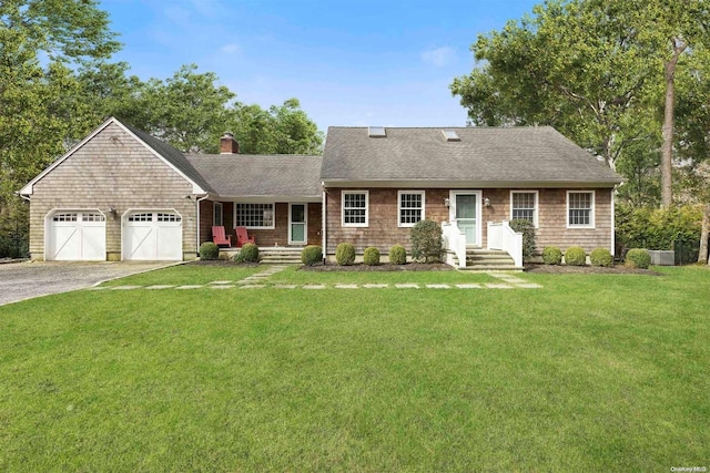 ranch-style home featuring a front yard and a garage