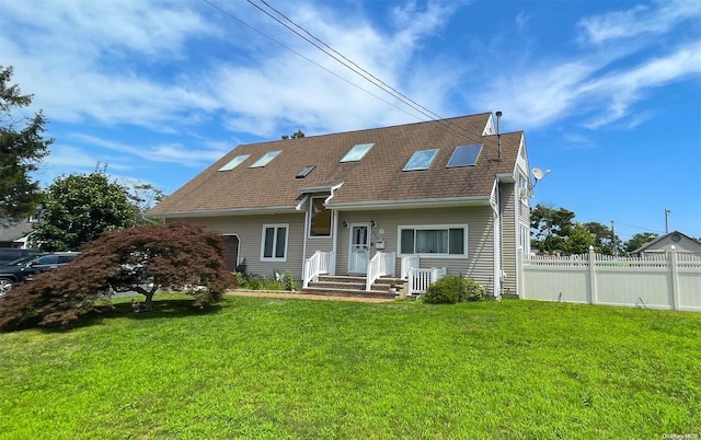 view of front of home featuring a front lawn