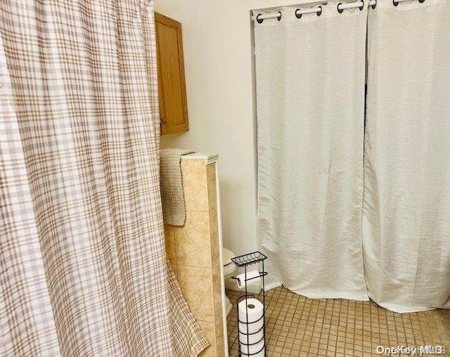 bathroom featuring tile patterned floors