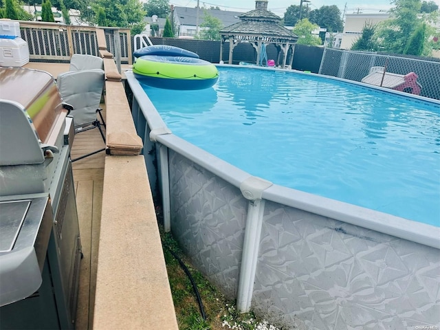 view of pool featuring a gazebo