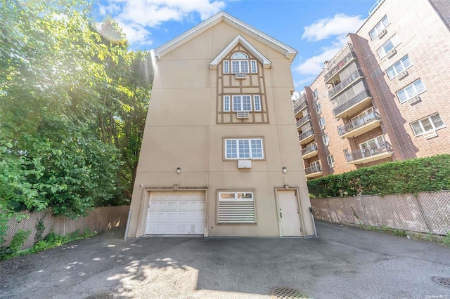 view of property featuring a garage