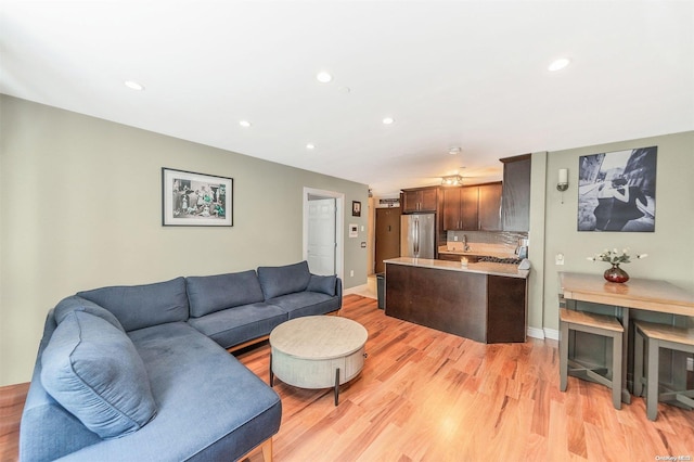 living room with light hardwood / wood-style floors