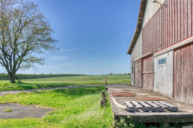 view of yard with a rural view