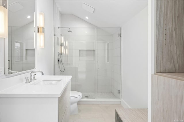 bathroom with vanity, lofted ceiling, tile patterned flooring, toilet, and a shower with shower door