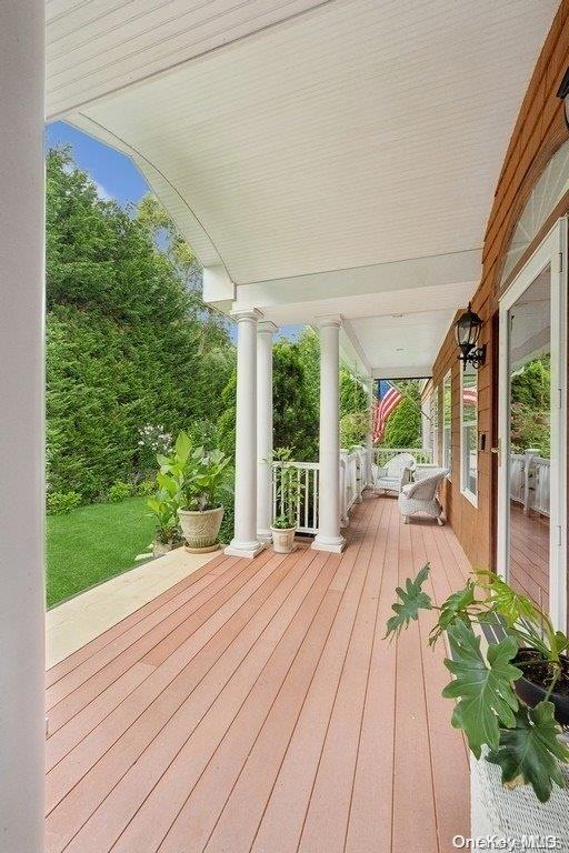 wooden deck featuring covered porch