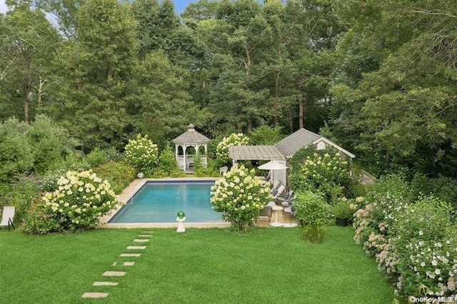 view of pool featuring a gazebo and a lawn