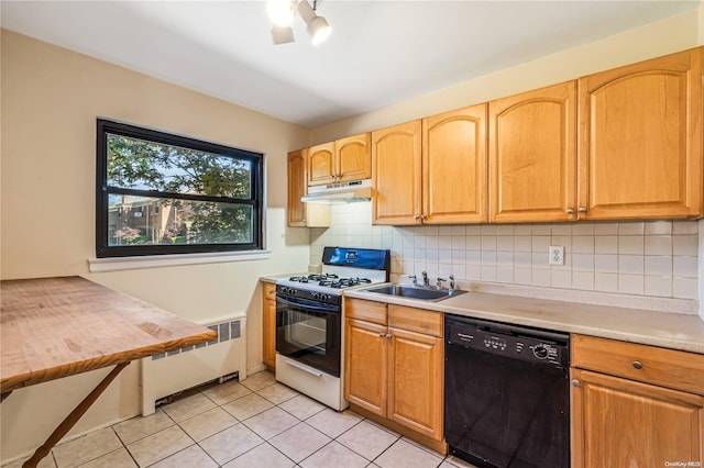 kitchen featuring radiator, sink, decorative backsplash, black dishwasher, and gas range gas stove