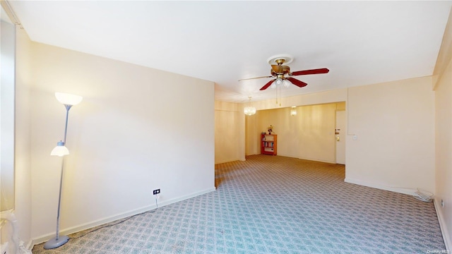 unfurnished room with carpet flooring and ceiling fan