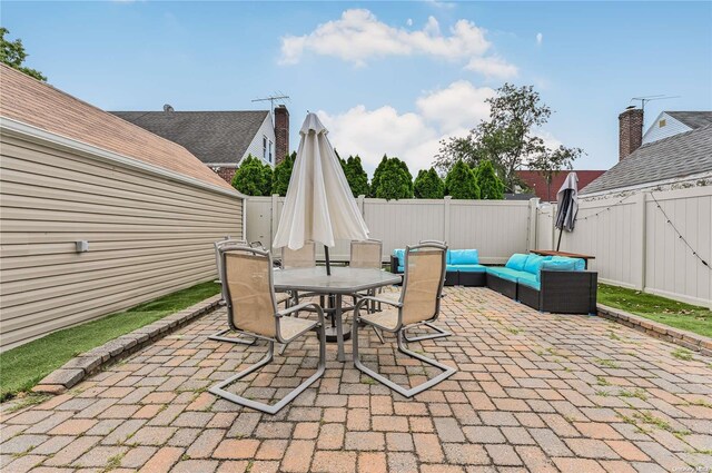 47 Alden Ave, Valley Stream, NY 11580 - fenced backyard featuring a patio area, outdoor lounge area, and outdoor dining area