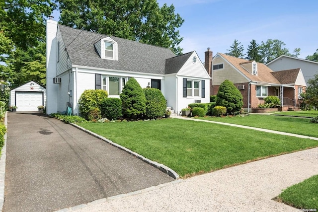 cape cod house with a front yard, an outdoor structure, and a garage