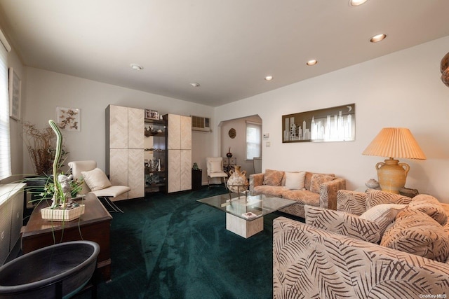 living room featuring dark colored carpet