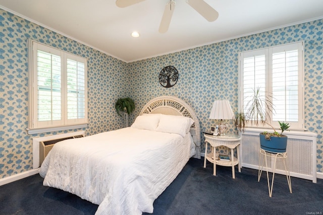 carpeted bedroom featuring radiator heating unit, an AC wall unit, ceiling fan, and ornamental molding