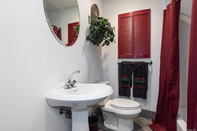 bathroom with toilet and shower / bathtub combination with curtain