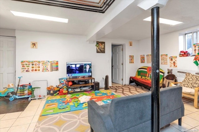 game room with light tile patterned floors