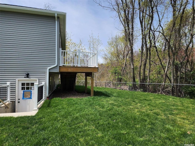 view of yard featuring a wooden deck