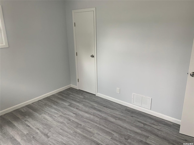 empty room featuring hardwood / wood-style floors