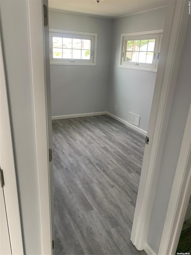 empty room featuring hardwood / wood-style flooring