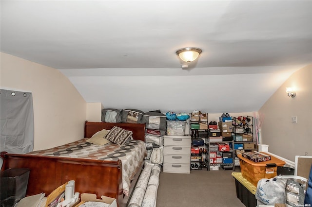 bedroom featuring carpet flooring and vaulted ceiling