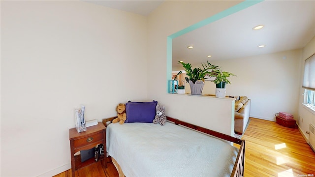 bedroom featuring hardwood / wood-style floors