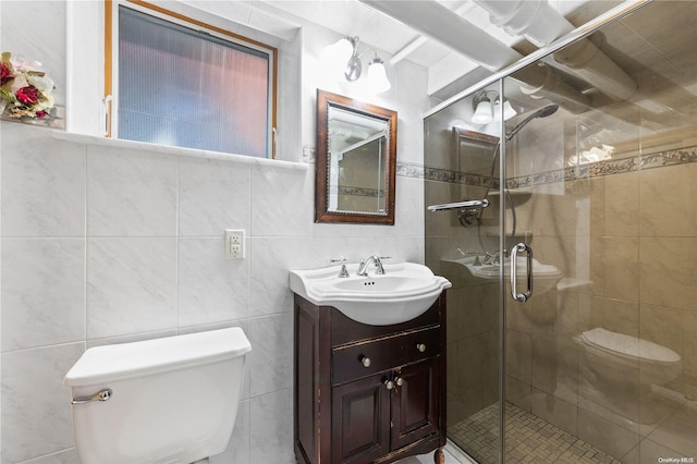 bathroom with toilet, an enclosed shower, and tile walls