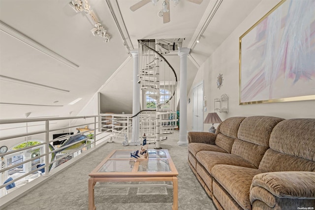 living room with carpet, a towering ceiling, and ceiling fan