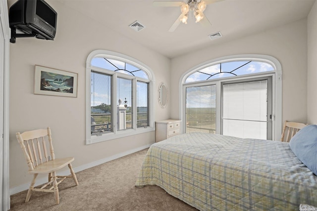 48 S Old Neck Rd, Center Moriches, NY 11934 - carpeted bedroom with baseboards, a ceiling fan, and access to outside