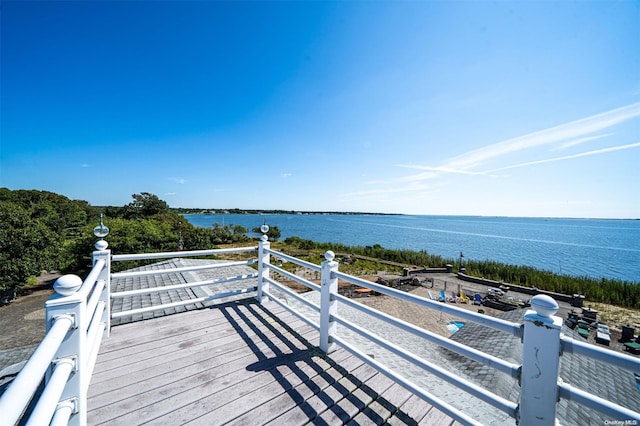 wooden terrace with a water view