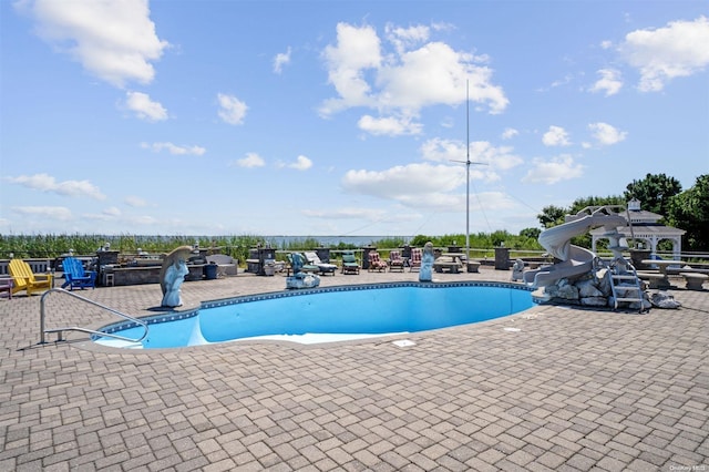 48 S Old Neck Rd, Center Moriches, NY 11934 - outdoor pool with a water slide, a gazebo, and a patio area