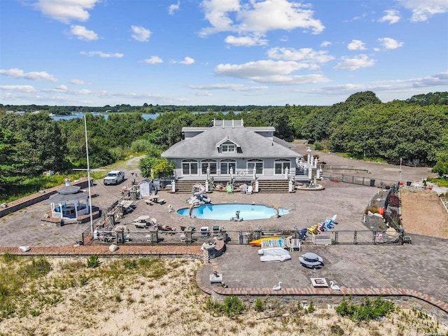 48 S Old Neck Rd, Center Moriches, NY 11934 - back of property with a wooden deck, a fenced backyard, stairway, a view of trees, and a patio
