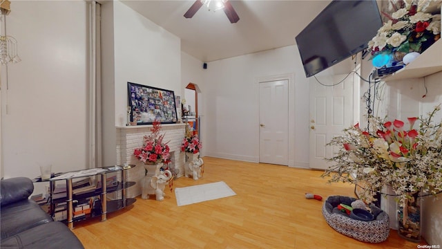 interior space featuring ceiling fan and wood-type flooring