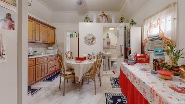 dining space featuring cooling unit and crown molding