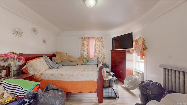 bedroom with light hardwood / wood-style flooring