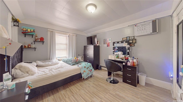 bedroom with light hardwood / wood-style flooring