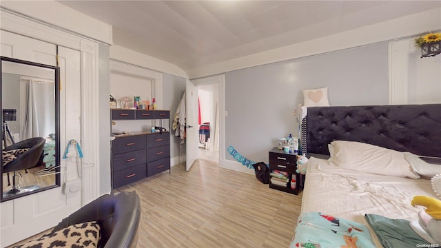 bedroom featuring hardwood / wood-style flooring