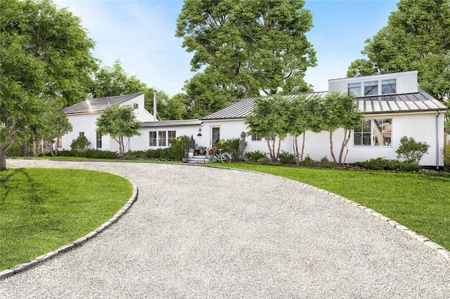 view of front of home with a front yard