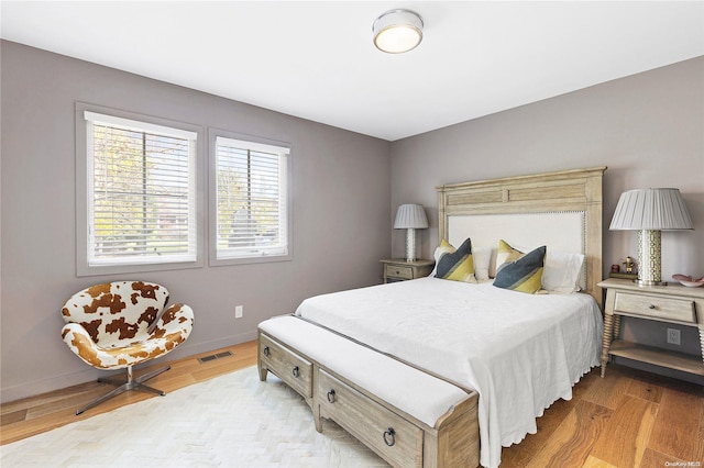 bedroom with light hardwood / wood-style flooring