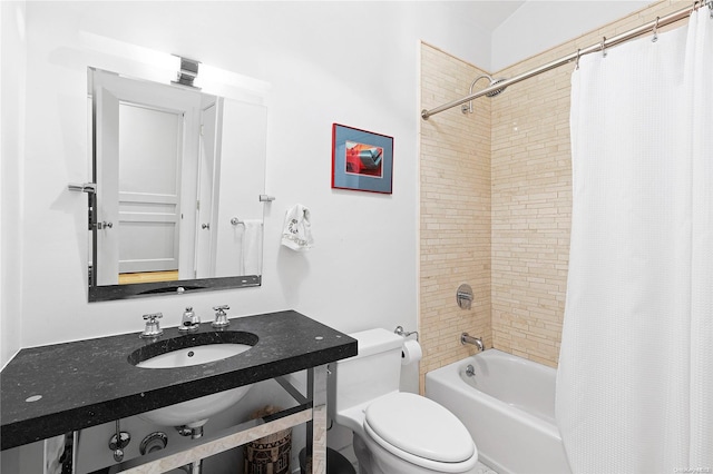 full bathroom with toilet, sink, and shower / tub combo