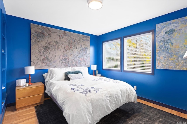 bedroom featuring hardwood / wood-style floors