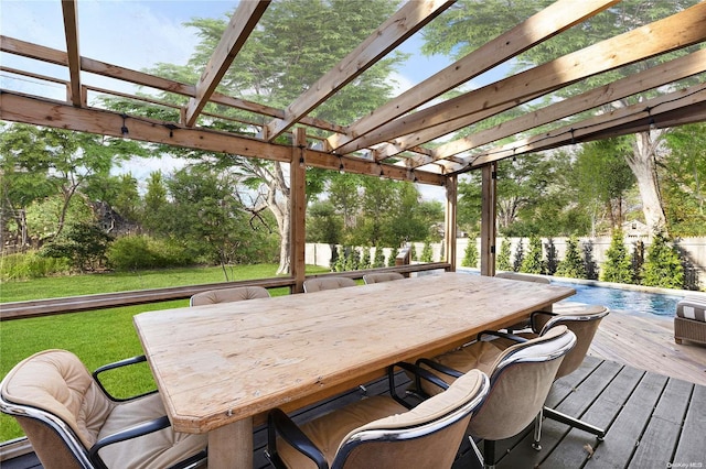 wooden terrace featuring a yard, a pergola, and a fenced in pool