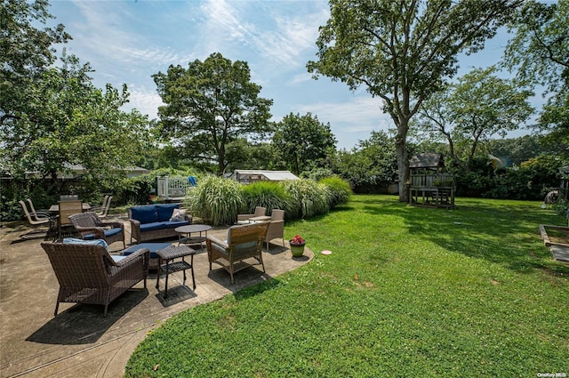 view of yard featuring a patio area and an outdoor hangout area